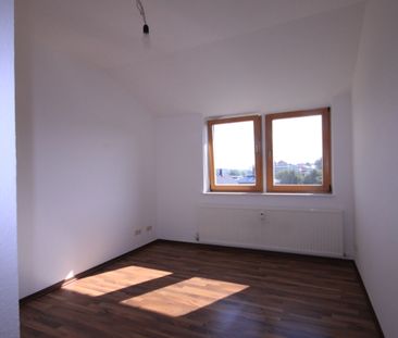 Tolle Dachgeschosswohnung mit großem Balkon - Foto 2