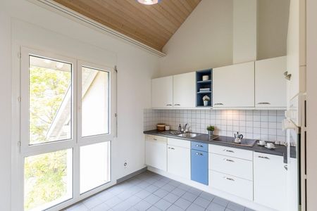 Generous 4.5-room apartment on the attic floor - Photo 2