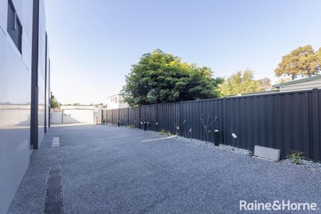 NEWLY BUILT! ARCHITECTURAL TOWNHOUSE IN BRUNSWICK AWAITS YOU - Photo 3