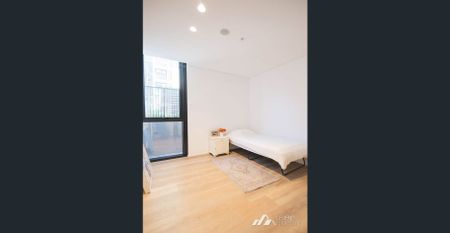 Stylish Modern Apartment with Oversized Study & Exceptional Upgrades - Photo 4