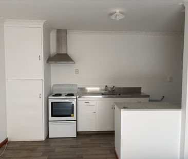 Cozy two bedroom rear unit - Photo 1