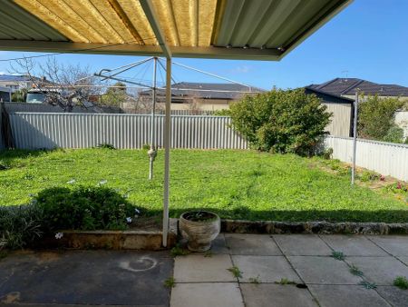 “Charming 2-Bedroom Home with Sunroom and Lovely Gardens” - Photo 5