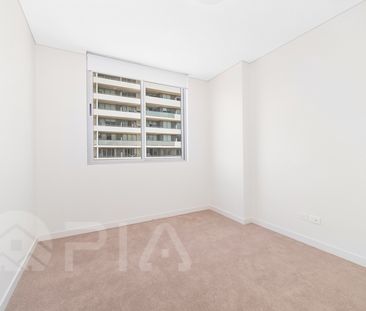 Modern 2 bedroom apartment close to amenities for lease - Photo 1