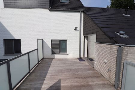 Modern en energiezuinig 2-slaapkamerappartement met carport en ruim terras (geen gemeenschappelijke huurlasten) - Photo 2