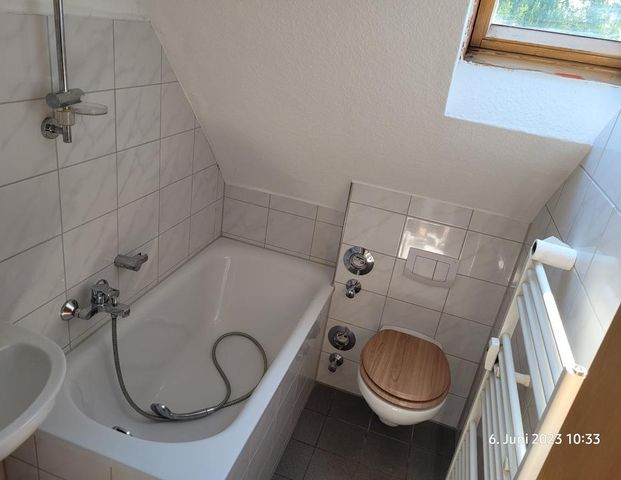 DG-Wohnung, 2,5 Raum, mit eigenem Garten - Foto 1