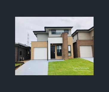 Modern 5-Bedroom Family Home in Prime Location - Photo 5