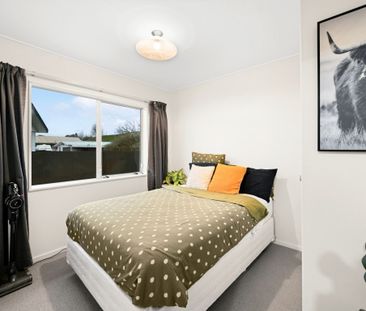 Modern and low-maintenance, this 3-bedroom, 1-bathroom home with a ... - Photo 1