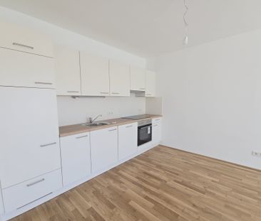 Erstbezug ab 01.10.2025: geförderte 2 Zimmer Wohnung mit großem Bal... - Photo 1