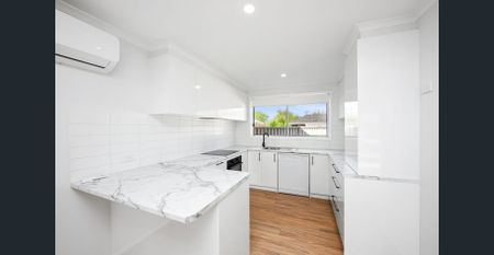 RENOVATED UNIT IN THE CBD - Photo 4