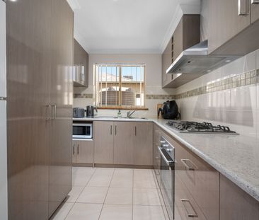 Neat, Tidy & Centrally Located – The Perfect Low-Maintenance Home - Photo 6