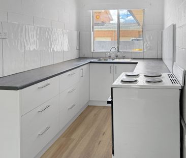 Freshly Renovated 2-bedroom Unit in Convenient South-Central Location - Photo 4