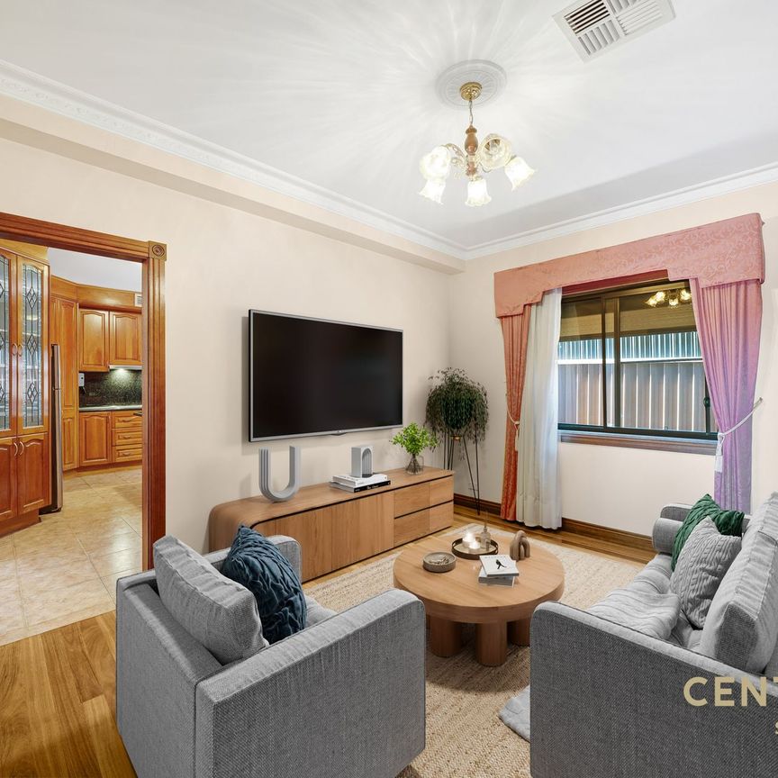 Stylish 4-Bedroom Home with Huge Garage and Family-Friendly Backyard - Photo 1