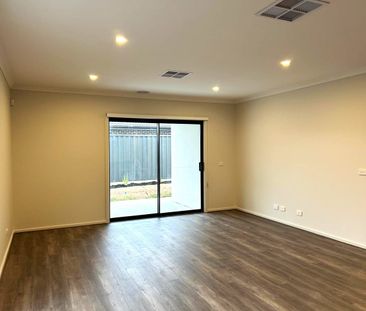 Explore a stunning new family residence in Orana Estate! - Photo 1