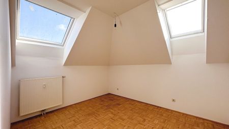 Helle 3-Zimmer-Dachgeschosswohnung mit Loggia - Foto 4