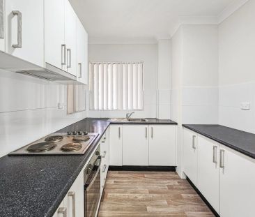 RENOVATED 2 BEDROOM UNIT WITH SPLIT AIR CONDITIONER - Photo 1