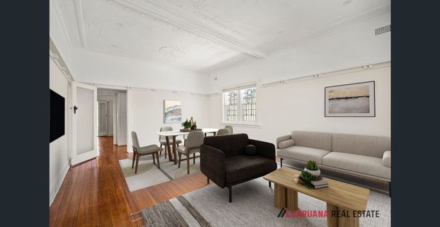 Prime Location • Filled with Natural Light • Freshly Renovated - Photo 1