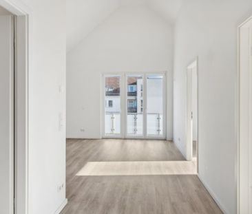 Familienfreundlich & ruhig: Hochwertige 3-Zimmer-Dachgeschosswohnun... - Photo 2