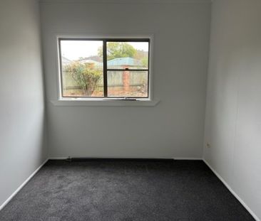 Tidy 2 bedroom cottage close to CBD - Photo 1