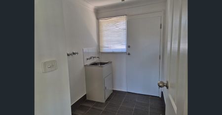 Spacious Four-Bedroom Home in Family-Friendly Location - Photo 5