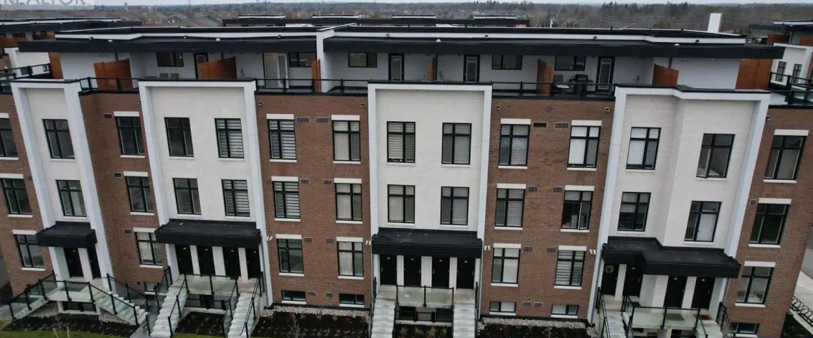 U221 - 9560 ISLINGTON AVENUE — 2 Bedroom - Photo 1