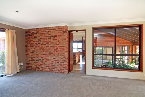 Spacious 4-Bedroom Home in a Quiet North Hill Location - Photo 1