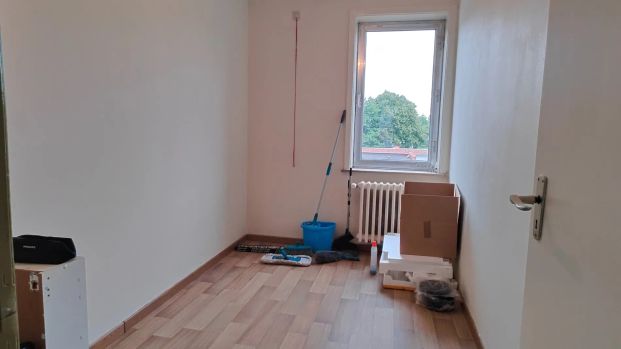 Centraal gelegen twee slaapkamer appartement met garage - Foto 1