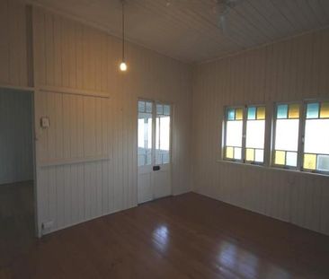 A SPACIOUS HIGH-SET HOME WITH 2 BEDROOMS PLUS ENCLOSED VERANDAS. - Photo 3