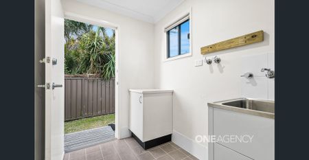 NEAT AND FUNCTIONAL TWO BEDROOM WITH YEAR ROUND COMFORT - Photo 2