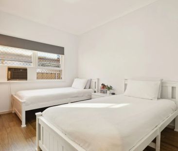 Stylishly updated north-to-rear facing home set on a tree-lined street - Photo 6