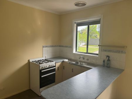 Neat Three-Bedroom Home in Prime Location - Photo 3