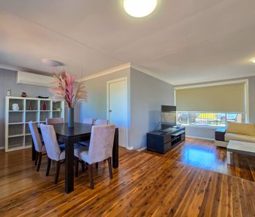 Spacious Family Home with Drive-Through Parking & Outdoor Entertaining - Photo 3