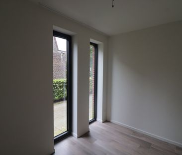 Gelijkvloers 2-slaapkamerappartement met ruim terras, carport en be... - Foto 4