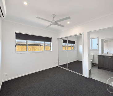 Modern 4-Bedroom Family Home with Double Garage in Greenbank - Photo 6