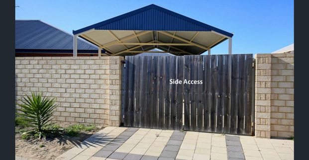 Modern Family Home with Multiple Living Areas & Side Access - Photo 1