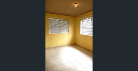 2 BEDROOM ON FIRST FLOOR UNIT, TILES FLOORING THOUGHT OUT. CLOSE TO SCHOOL. - Photo 2