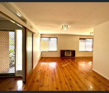 Comfortable Family Living with Spacious Backyard - Photo 3