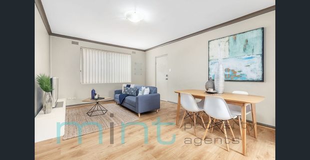 Spacious Two-Bedroom Apartment in a Convenient Location - Photo 1