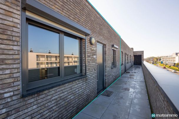 INSTAPKLAAR APPARTEMENT MET 2 SLAAPKAMERS, TERRAS EN AUTOSTAANPLAATS GELEGEN NABIJ HET CENTRUM VAN BILZEN - Photo 1