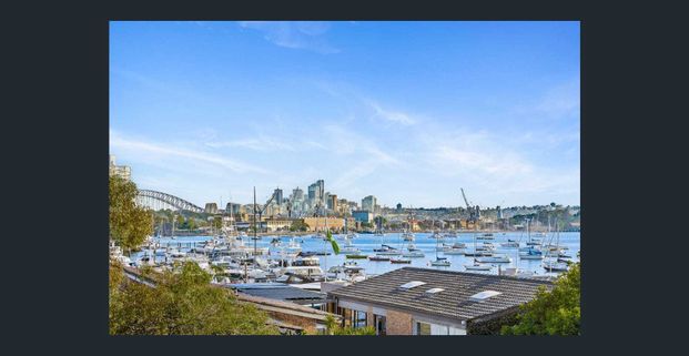 Spacious three-bedroom apartment with harbour views just metres from the waterfront marina - Photo 1