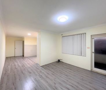 Renovated Two Bedroom Unit - Photo 2