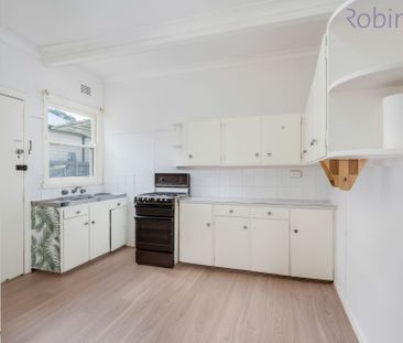 Renovated Two Bedroom Home with garage - Photo 6