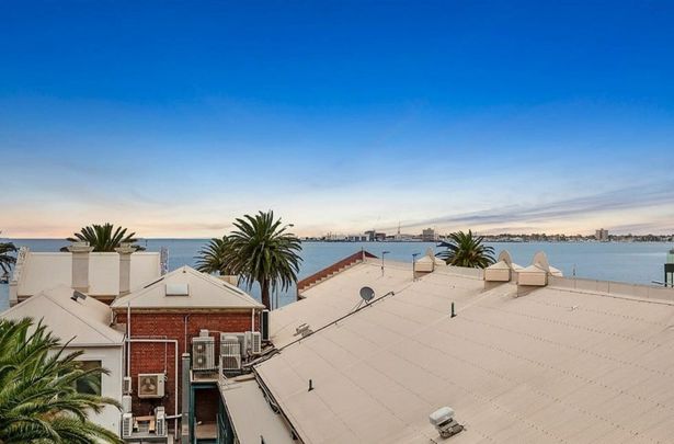 Stunning Split-Level Warehouse Conversion with Bay Views & Luxe Space - Photo 1