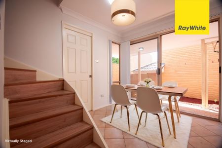 UPDATED STREET-FACING TOWNHOUSE WITH SPACE, STYLE & CONVENIENCE - Photo 2