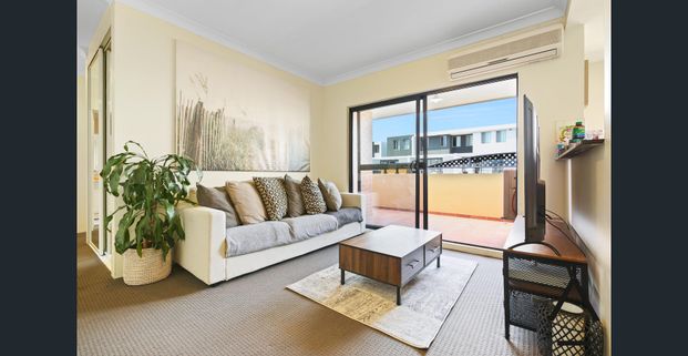 Centrally Situated, Private and Secure Penthouse — Three Bedroom, Two Bathroom Oasis in a Superb Location - Photo 1