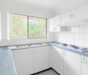 Two-Bedroom Unit with Balcony & Garage – Prime Location Near Westme... - Photo 3