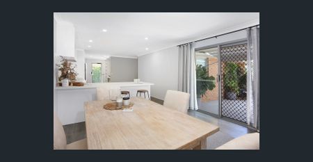 GREAT FAMILY HOME WITH A LARGE BACK YARD! GARDENS INCLUDED IN RENT! - Photo 2