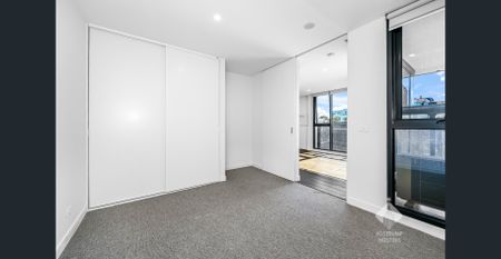 Sleek Urban Living at Its Finest I Unfurnished with Car Stacker - Photo 4