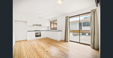 Spacious Family Home with Modern Updates & Self-Contained Retreat! - Photo 3