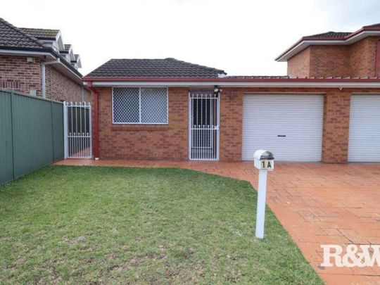ELITE DUPLEX WITH GARAGE - Photo 1