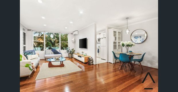 Immaculate Apartment with A Leafy Outlook - Photo 1